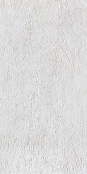 Matte white porcelain tile with refined concrete texture, exuding urban elegance and minimalist sophistication for modern interiors.