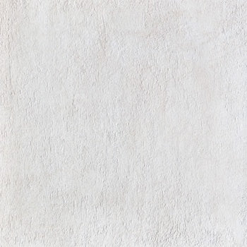 Elegant matte white porcelain tile with refined concrete texture, exuding urban sophistication and minimalist charm.
