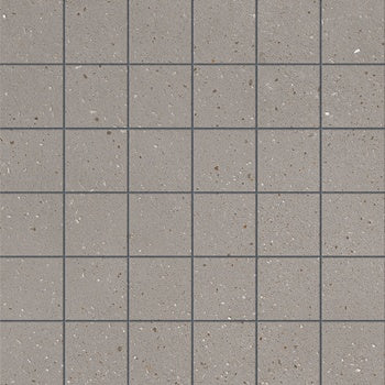 Matte silver-gray porcelain mosaic tiles with an earthy, textured concrete effect, exuding urban sophistication and minimalist strength.
