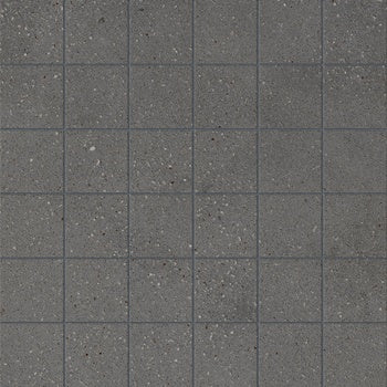 Dark grey porcelain mosaic tiles with a matte, textured finish, evoking the raw elegance of sedimentary rock and industrial minimalism.