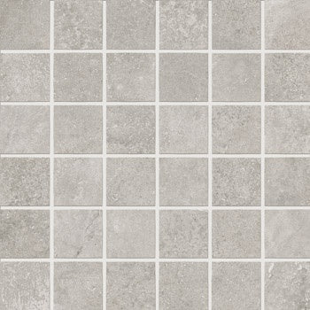 Matte beige porcelain mosaic with subtle concrete texture, interlocking square tiles in a refined straight-stack pattern.