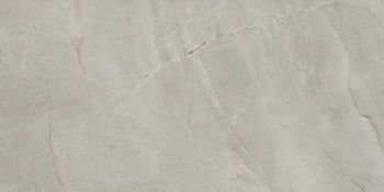Rectified porcelain tile with soft gray marble veins and a semi-gloss finish, evoking timeless luxury and natural elegance.
