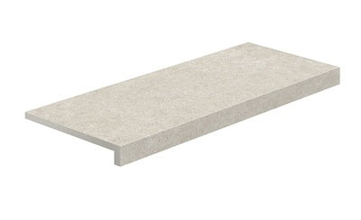 L-shaped porcelain corner in textured Bianco Mix stone finish, matte and slip-resistant, for elegant outdoor transitions.