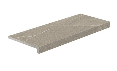 L-shaped porcelain corner in warm greige limestone texture with polished edges and matte 3D finish for refined outdoor transitions.