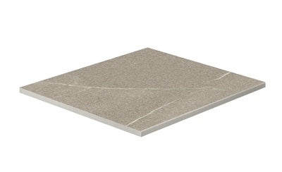 Matte greige limestone-look porcelain border tile with warm textured surface and polished edges, evoking rustic Italian elegance.
