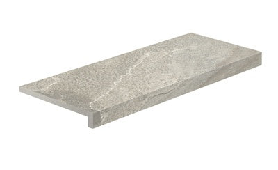 Elegant L-shaped porcelain corner in Bianca quartzite, matte 3D texture with polished edges for refined outdoor transitions.