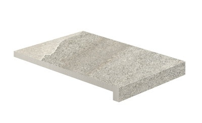 Elegant L-shaped porcelain corner in Bianca quartzite, textured matte finish for refined outdoor transitions.