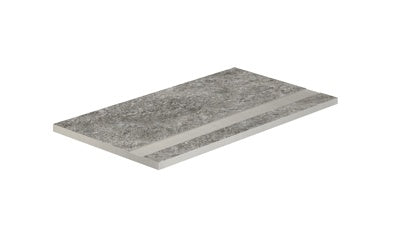 Elegant quartzite-inspired porcelain pool edge in soft gray with a refined matte finish and subtle 3D texture for sophisticated outdoor spaces.