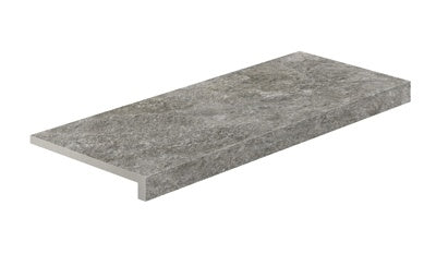 Elegant matte gray quartzite-inspired porcelain corner tile with a softly textured surface and polished edge for refined outdoor transitions.