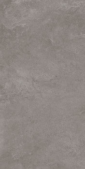 A textured matte gray porcelain tile with a refined concrete aesthetic and rectified edges for seamless luxury interiors.