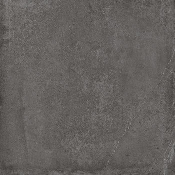 Dark gray porcelain tile with a textured concrete finish, matte surface and refined rectified edges for a sleek, industrial-luxe aesthetic.
