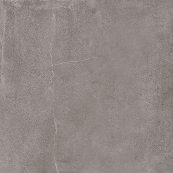 A large-format matte gray porcelain tile with a refined 3D concrete texture and rectified edges for seamless luxury.