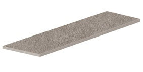 Dark gray porcelain plank with a bush-hammered rustic texture and polished edges, evoking raw concrete elegance for refined outdoor terraces.