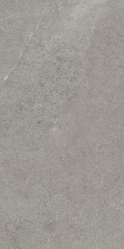 Matte gray porcelain tile with refined concrete texture, rectified edges, and subtle silver undertones for modern elegance.