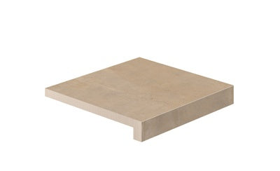 A textured terracotta L-shaped corner tile with warm, earthy tones and rustic charm, crafted in durable Italian porcelain.