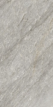 Elegant matte porcelain tile in soft gray quartzite, evoking primordial serenity for refined contemporary interiors.