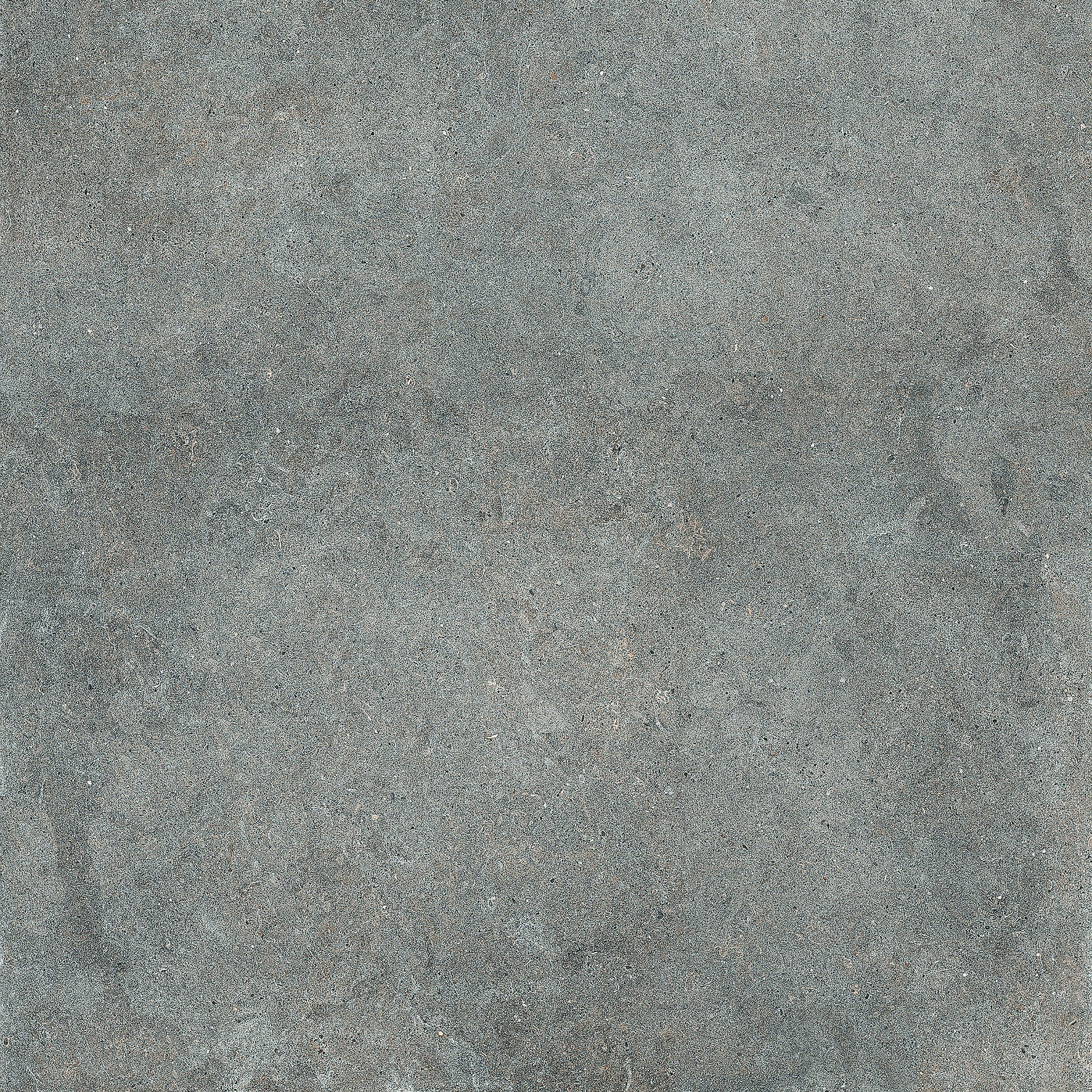 Elegant dark gray porcelain tile with a refined matte finish, evoking natural stone serenity for modern interiors.