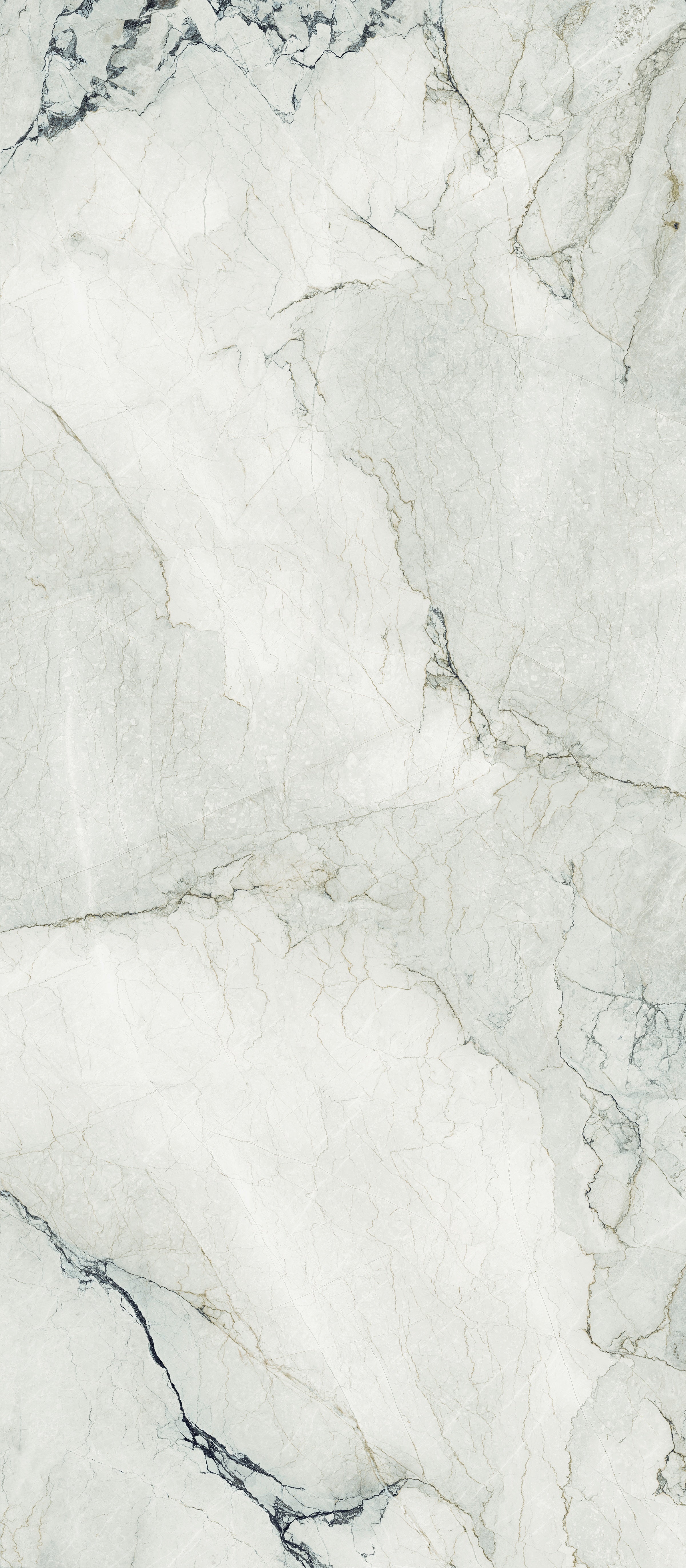 A large-format porcelain tile with a refined white marble look, delicate veining, and a semi-matte finish for timeless luxury interiors.