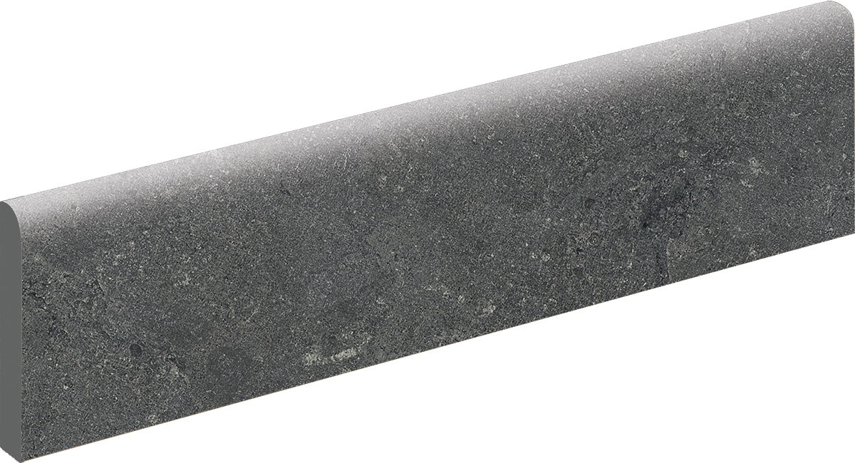 Dark gray porcelain bullnose trim with a soft matte texture, offering a sleek, modern edge for eclectic and joyful interiors.
