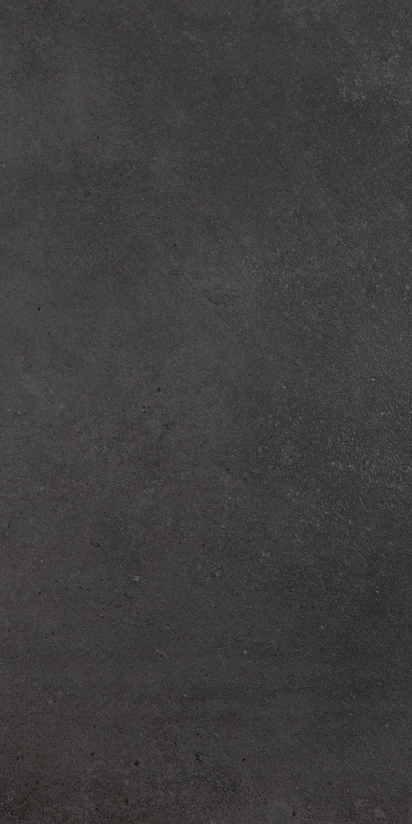 Black porcelain tile with a matte, oxidized finish, evoking handcrafted terracotta charm and timeless earthy elegance.
