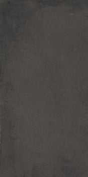 Black porcelain tile with a matte, oxidized finish, evoking handcrafted terracotta charm and timeless earthy elegance.