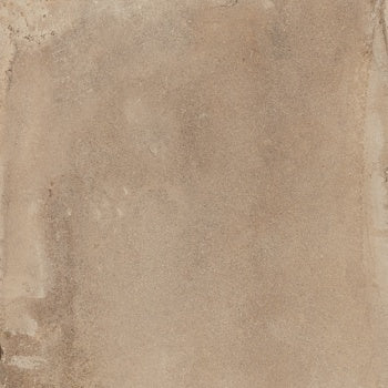 Matte terracotta porcelain tile with warm, oxidized tones and a handcrafted clay texture, evoking timeless Tuscan elegance.