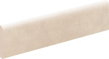 Handcrafted terracotta bullnose trim in warm beige, matte finish, artisan texture for refined contemporary interiors.