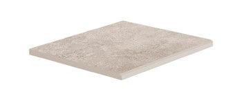 Square border tile in warm sand hue with a matte, slip-resistant texture and polished edges, blending wood-effect inlays with minimalist porcelain elegance.