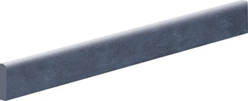 Vibrant blue porcelain bullnose trim with playful 3D texture and semi-gloss finish for eclectic modern interiors.