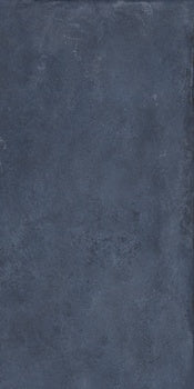 Deep blue porcelain tile with a lively 3D texture, evoking free-spirited elegance in a semi-glossy finish for bold, joyful spaces.