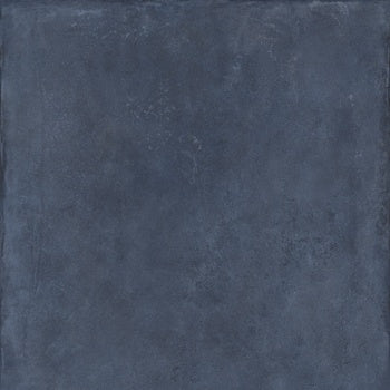 Vibrant blue porcelain tile with a playful 3D texture and semi-glossy finish, evoking the free spirit of sedimentary stone in bold, high-saturation hues.