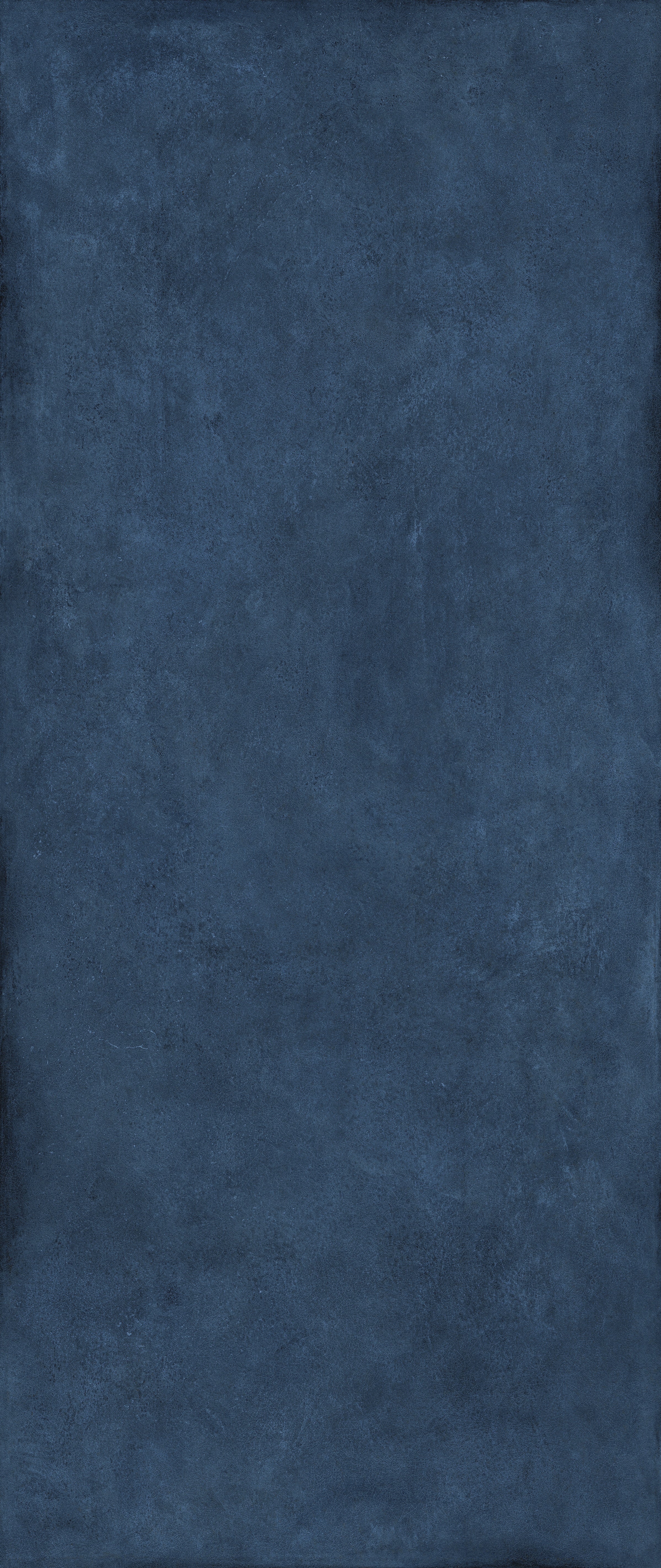 Vibrant blue porcelain tile with bold 3D texture, evoking playful luxury and dynamic movement for eclectic modern spaces.