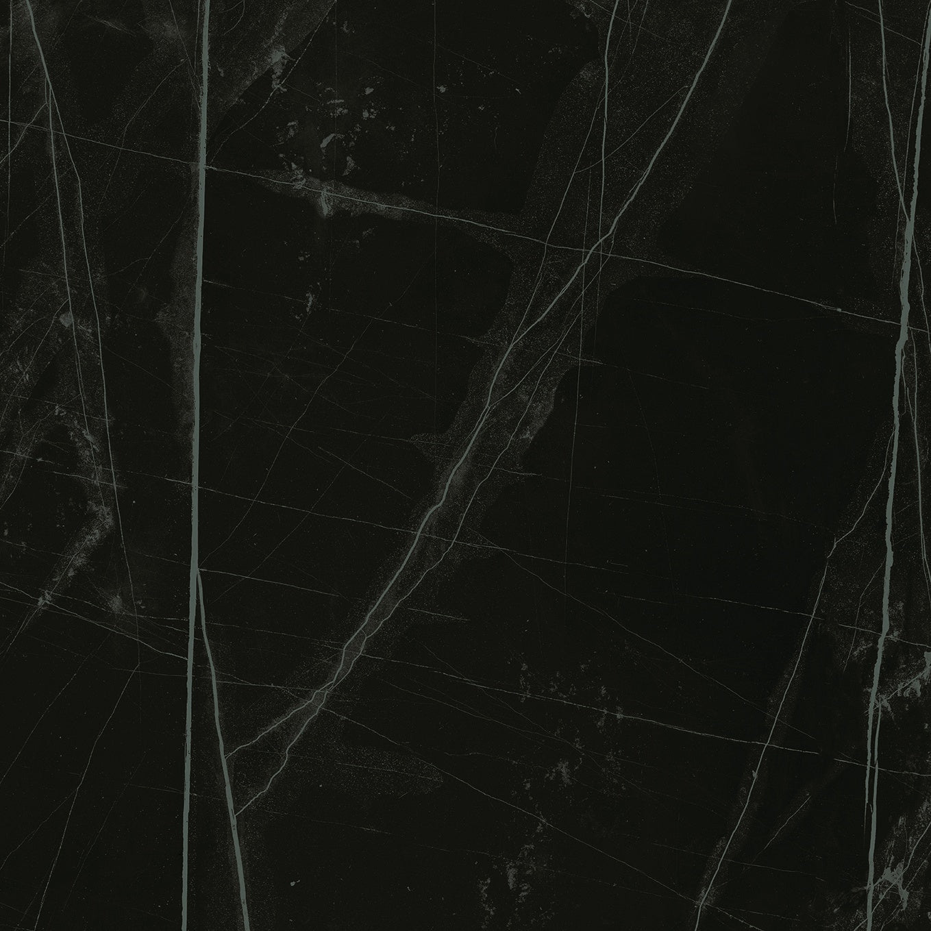Black marble-look porcelain tile with gold-enhanced veining, exuding timeless elegance and seductive refinement for luxurious interiors.