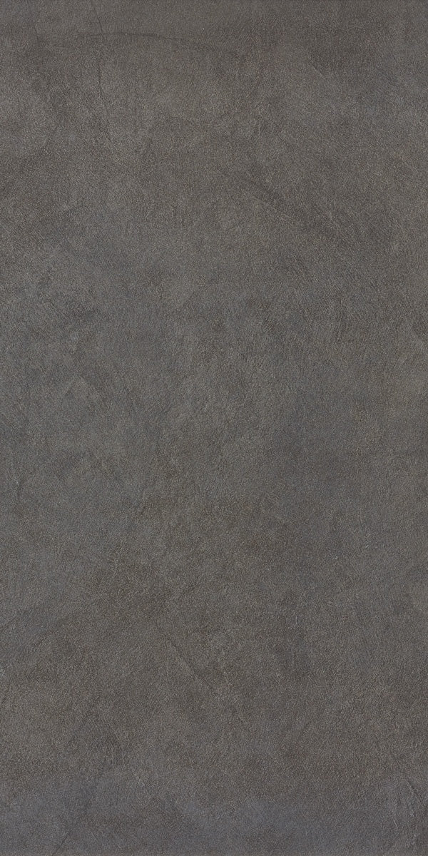 Dark gray porcelain tile with a soft matte resin texture, offering a sleek contemporary surface for refined minimalist interiors.