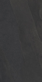 Black porcelain slate tile with soft ripples and weathered furrows, evoking a serene stone forest in matte, textured luxury.