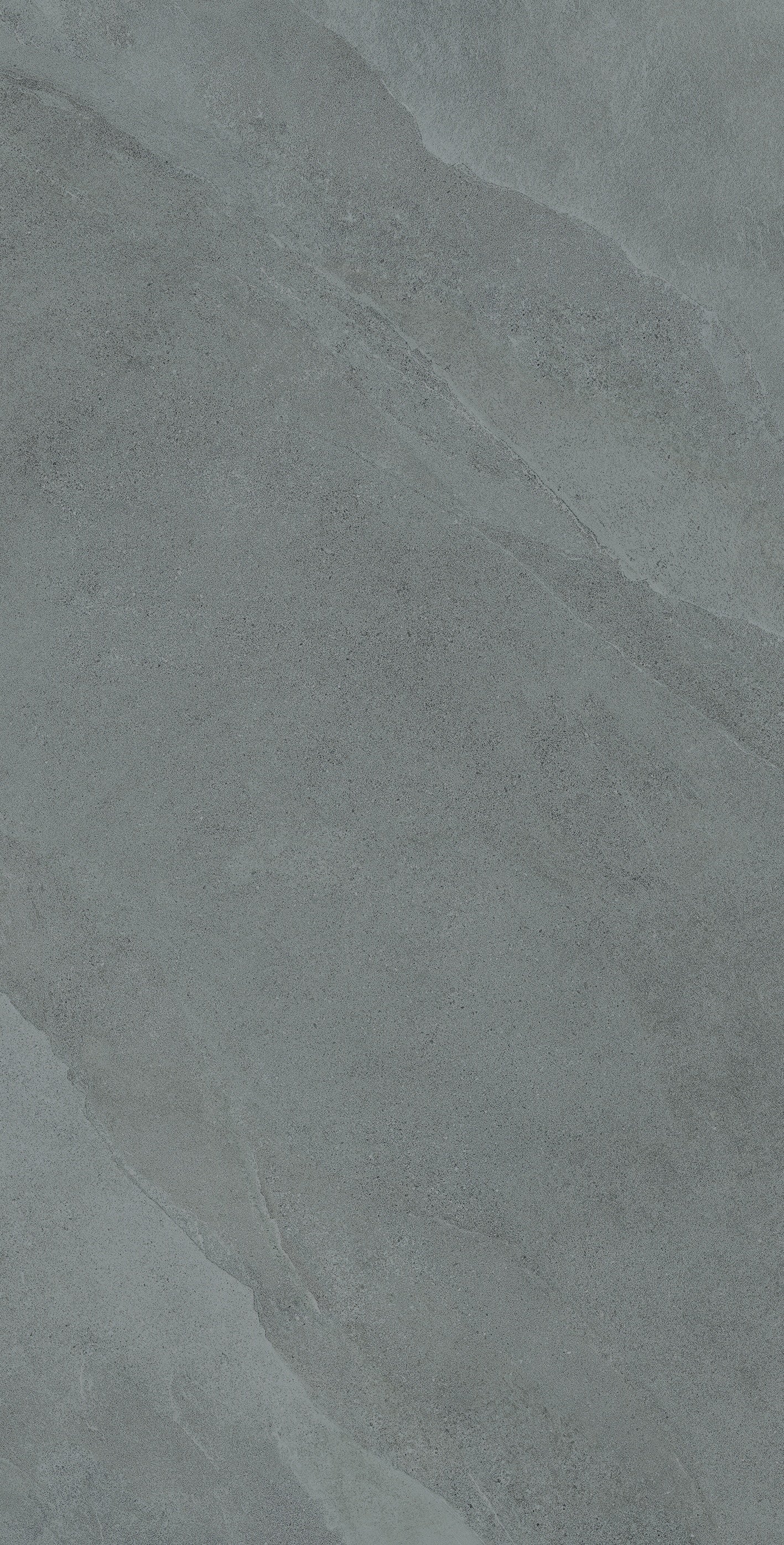 Slate-gray porcelain tile with soft ripples and weathered furrows, evoking the raw elegance of a stone forest. Matte, bush-hammered texture for serene, grounded luxury.