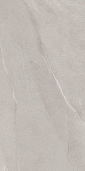 A matte white porcelain tile with a softly textured, bush-hammered surface, evoking weathered slate and the organic ripples of a stone forest.