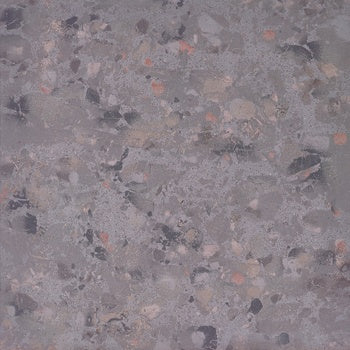 Large-format dark gray terrazzo-look porcelain tile with raw material chips and a semi-matte textured surface, exuding industrial elegance.
