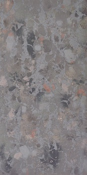 Dark grey terrazzo-look porcelain tile with raw material chips, semi-matte 3D texture, and refined industrial elegance.