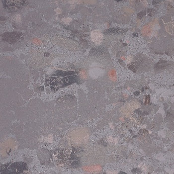 Dark gray terrazzo-effect porcelain tile with raw, unpredictable chips and a semi-matte 3D texture for refined industrial elegance.