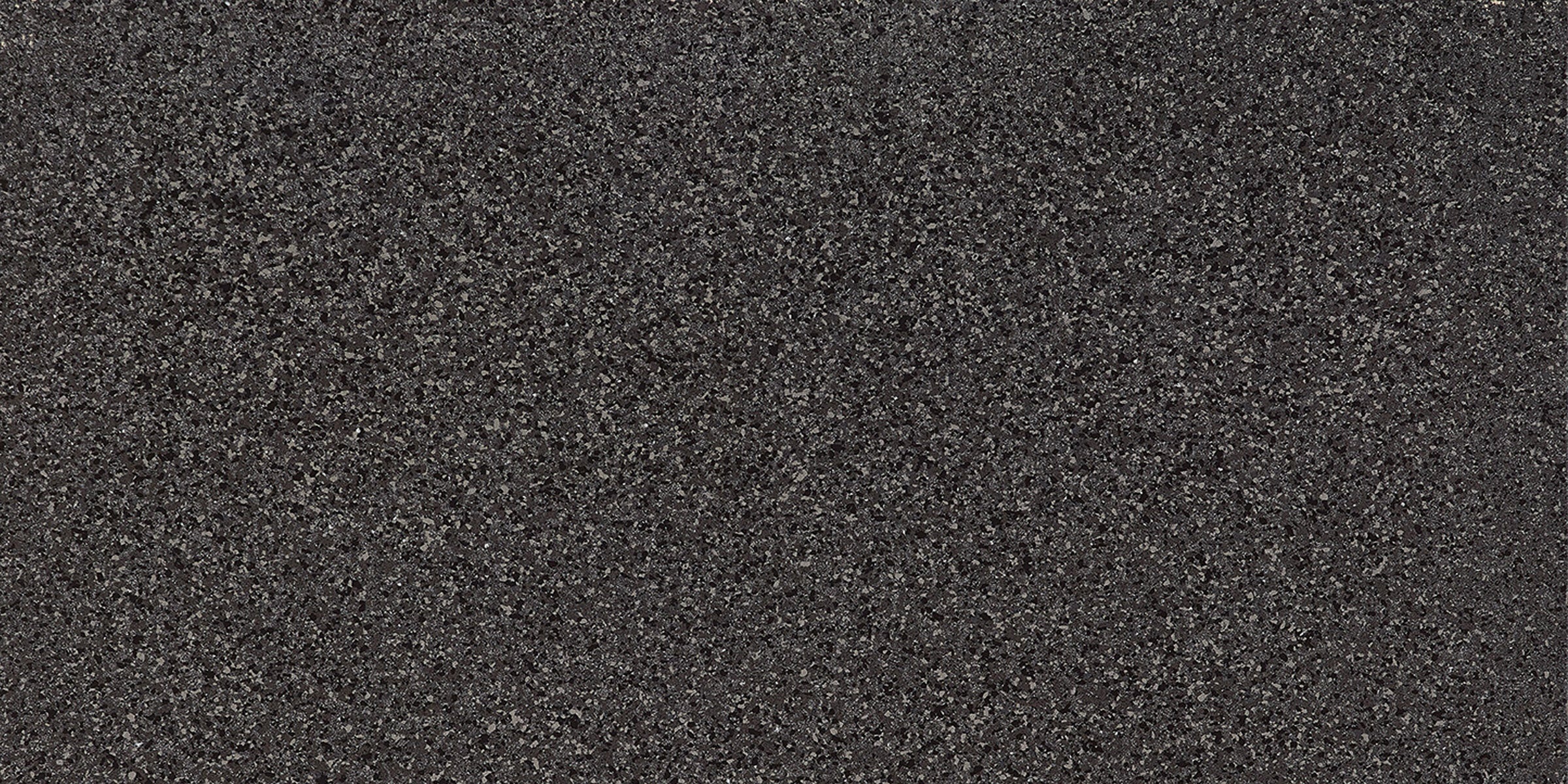 Black terrazzo porcelain tile with concrete-inspired matte finish and subtle chips, exuding timeless elegance and bold modernity.