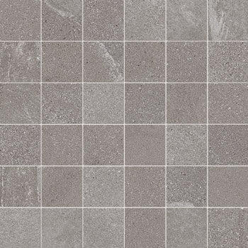 Soft gray porcelain mosaic with weathered slate texture, rippled furrows, and a serene stone-forest aesthetic in a minimalist straight-stack design.