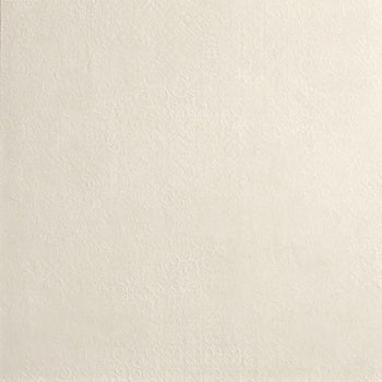 A large-format matte porcelain tile with subtle 3D texture, luminous reflections, and an elegant concrete-inspired white surface.