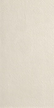 A textured white porcelain tile with delicate deco patterns, luminous reflections, and an elegant matte concrete-inspired finish.