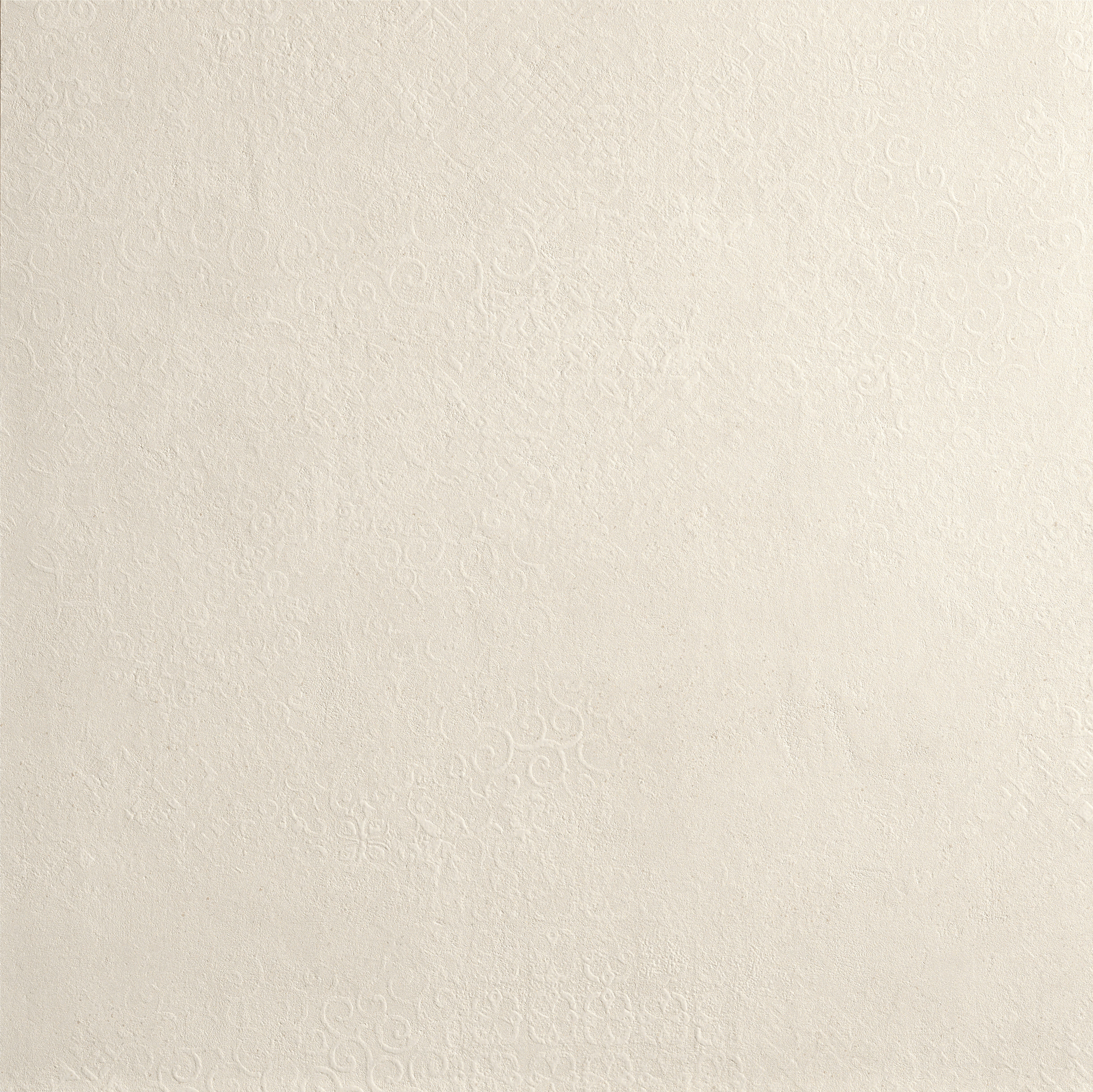 Elegant white porcelain bullnose trim with delicate 3D texture and luminous matte finish for refined industrial-chic spaces.