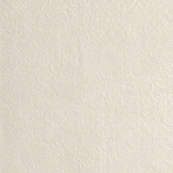 A textured matte porcelain tile with delicate, luminous patterns and subtle concrete-inspired depth in refined white.