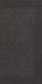Industrial-chic porcelain tile in deep matte gray with subtle multicolored grains and a raw, concrete-inspired texture for timeless elegance.