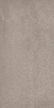 Industrial-chic porcelain tile in soft greige with subtle multicolored flakes, embodying raw elegance and timeless urban sophistication.