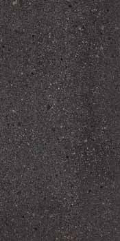 Industrial-chic dark gray porcelain tile with subtle multicolored grains and a raw, matte concrete finish for modern elegance.
