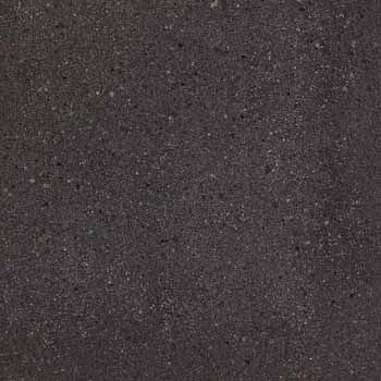 Industrial-chic porcelain tile in dark grey with subtle multicolored grains and a matte, slip-resistant surface, exuding raw urban elegance.